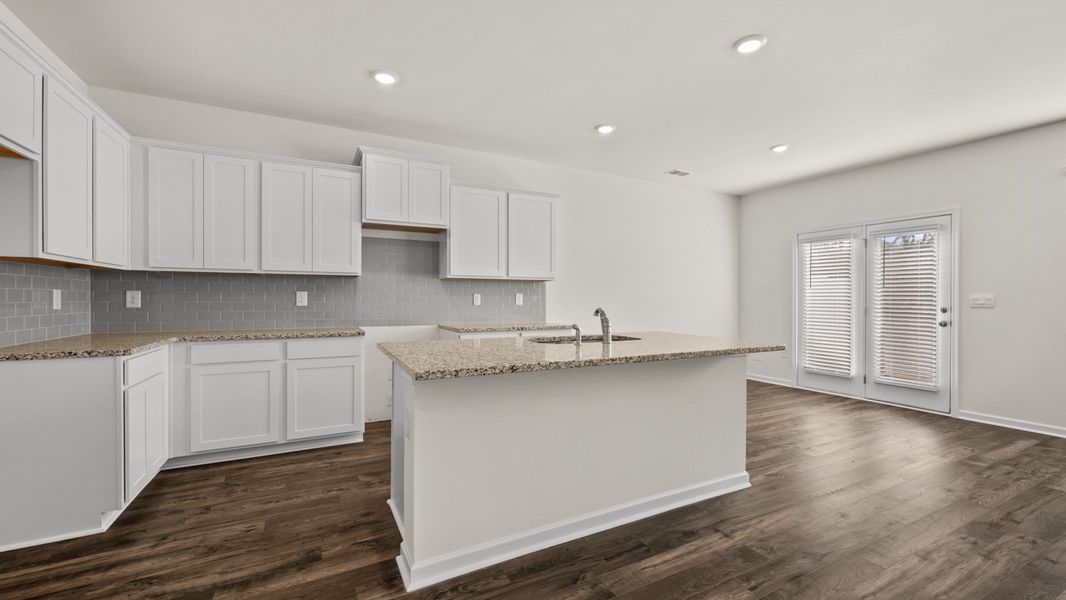 Representative furnished interior of a home built from the Salisbury by D.R. Horton in Inverness at Sugarloaf, Lawrenceville (Image 7).