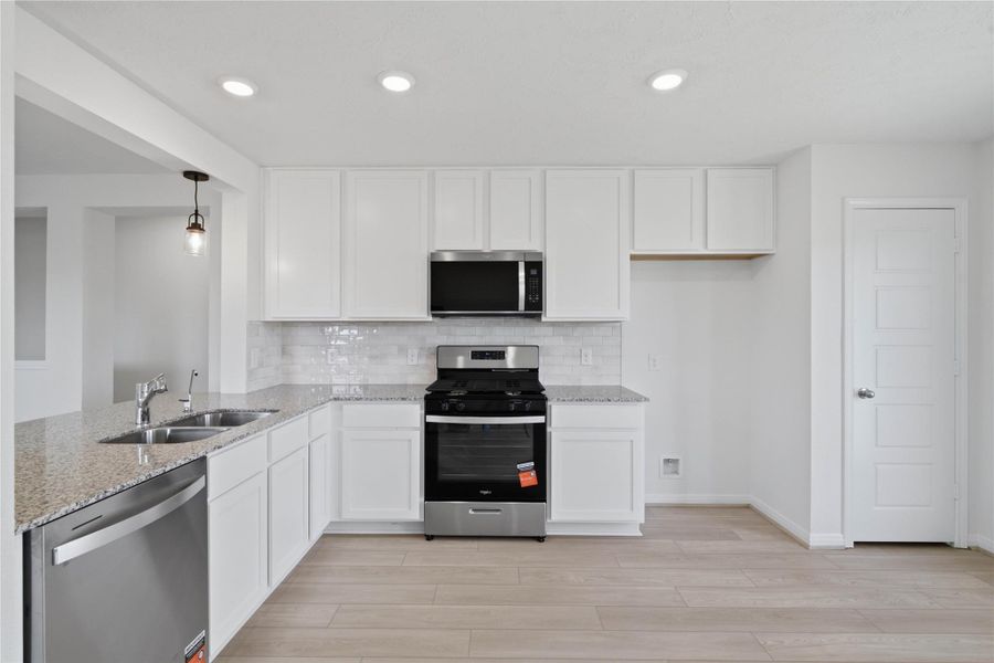 Another perspective of this beautiful kitchen.