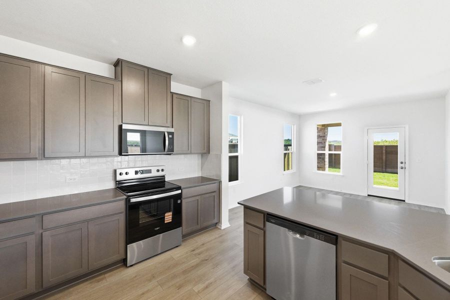 Furnished interior view inside a new home in Stoney Chase, Del Valle (Image 8).