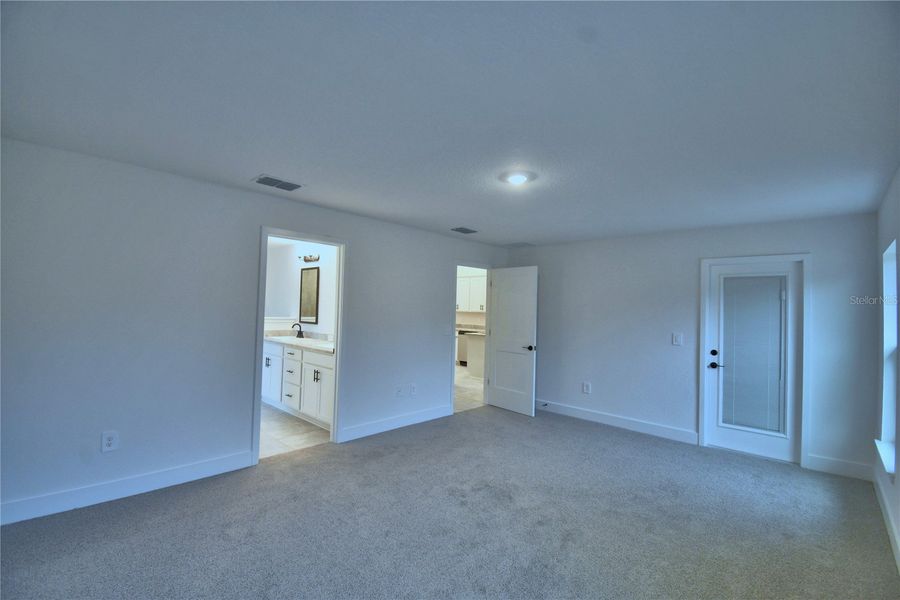 Spacious, unfurnished interior of a new home in Cadence Crossing, Auburndale (Image 34).