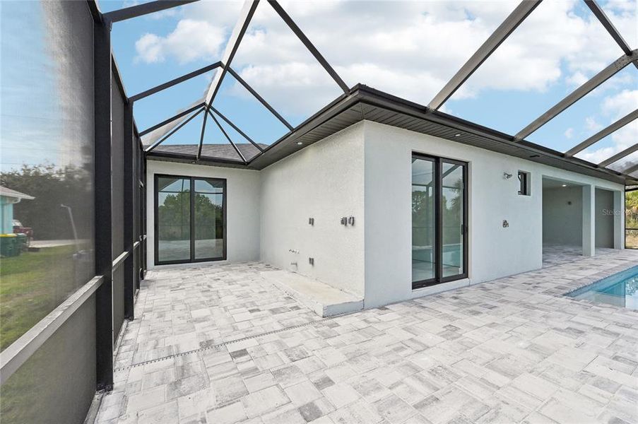 Exterior details and patio area of a home in , Port Charlotte (Image 24).