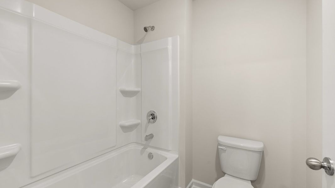 Representative furnished interior of a home built from the Hayden by D.R. Horton in Northwoods at Mirror Lake, Villa Rica (Image 14).