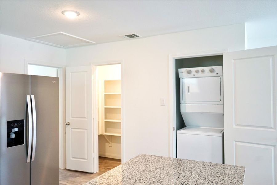 Furnished interior view inside a new home in , Conroe (Image 8).