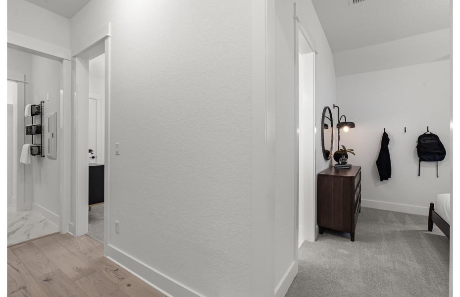 Representative furnished interior of a home built from the Doucette by Pulte Homes in Bison Ridge, San Antonio (Image 26).