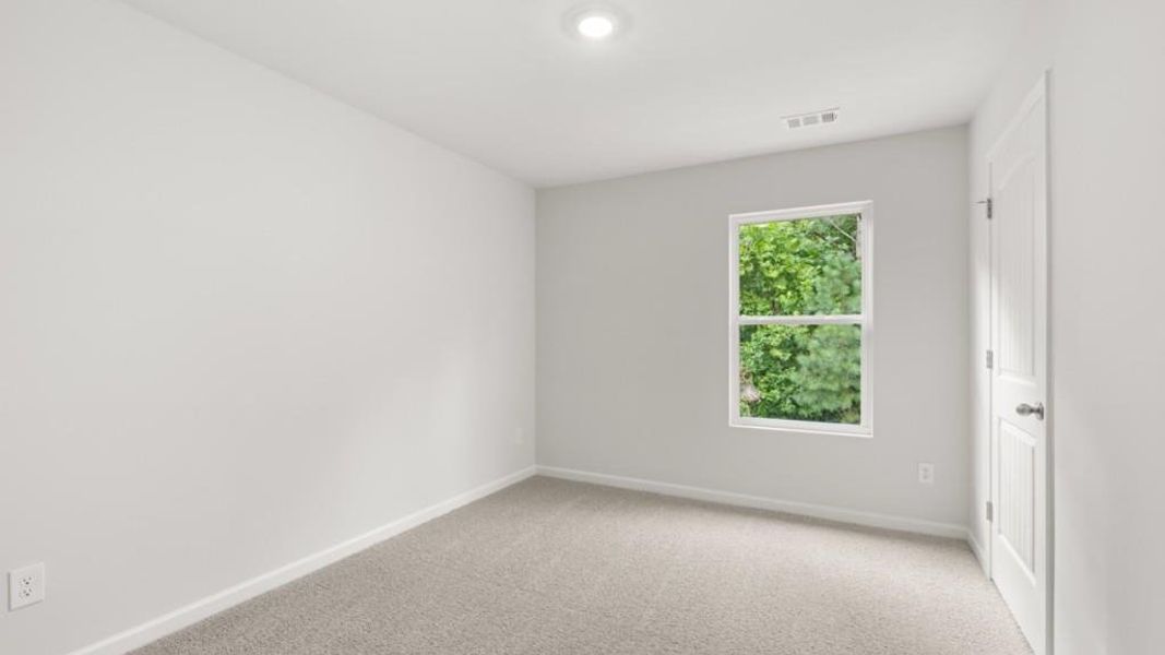 Spacious, unfurnished interior of a new home in Waypoint, Flowery Branch (Image 16).