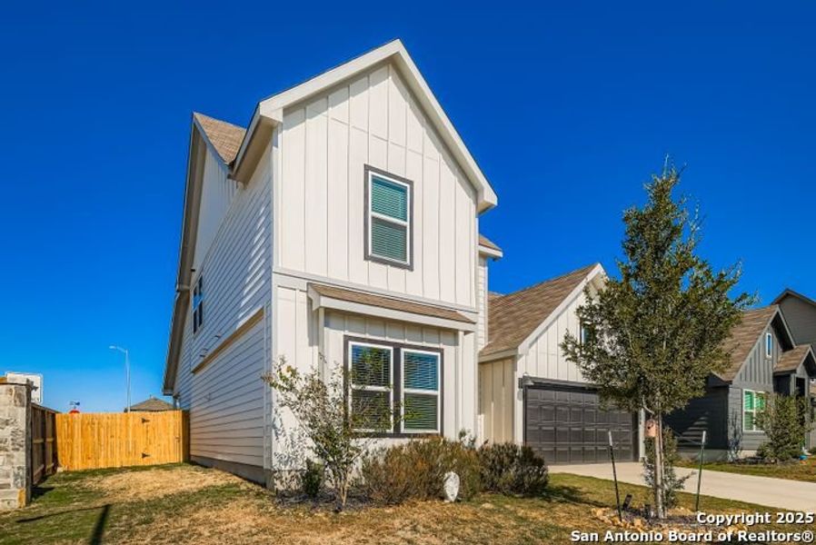 Front exterior of a new home in Riverstone at Westpointe, San Antonio, TX, highlighting curb appeal (Image 1).
