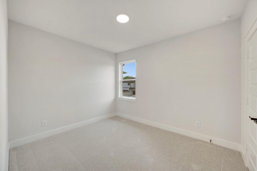 Spacious, unfurnished interior of a new home in Two Step Farm - Cottages Row Collection, Montgomery (Image 21).