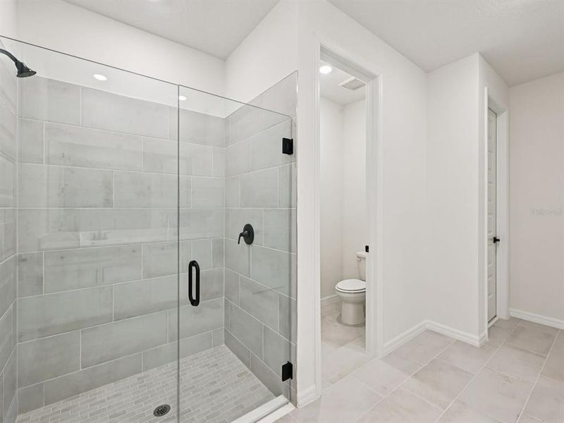 Furnished interior view inside a new home in Oakfield Trails - Premier Series, Parrish (Image 11).