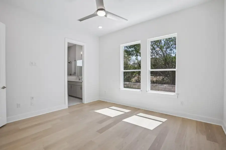 Spacious, unfurnished interior of a new home in Saddle Ridge at Wildhorse Ranch, Manor (Image 16).