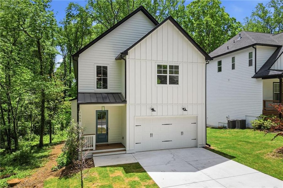 Front exterior of a new home in , Marietta, GA, highlighting curb appeal (Image 1). Front exterior of a new home in , Marietta, GA, highlighting curb appeal (Image 1).
