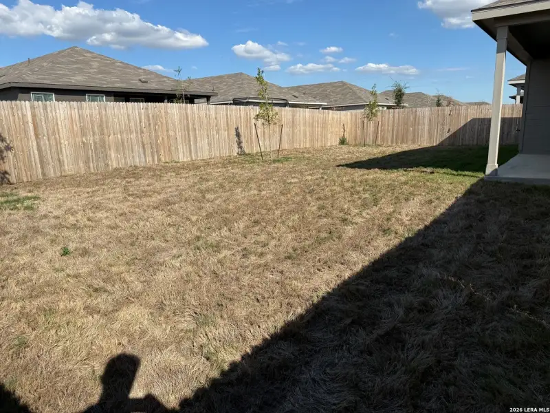 Exterior details and patio area of a home in Rose Valley, Converse (Image 2).