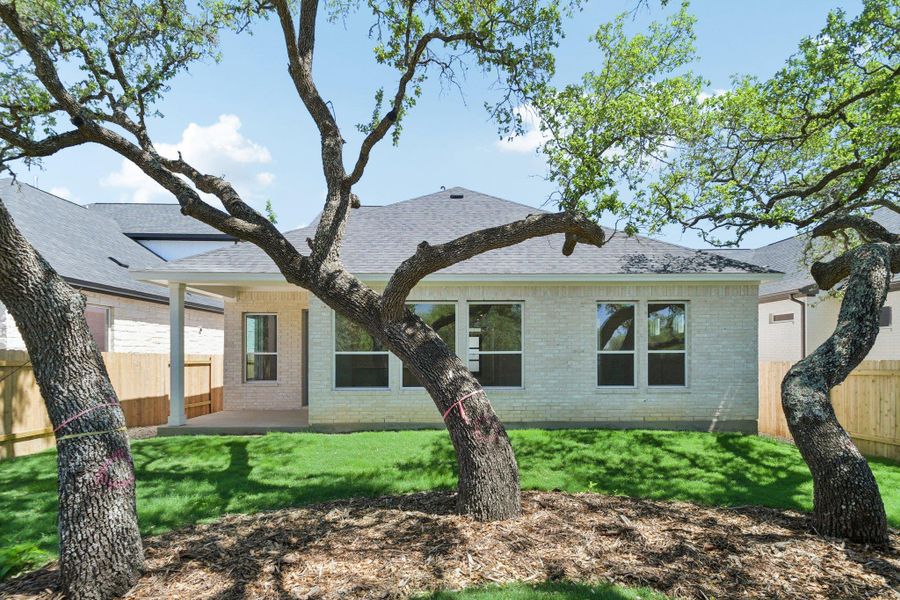 Exterior details and patio area of a home in Persimmon, Buda (Image 24).