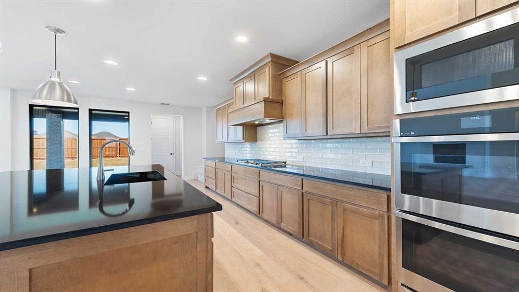Furnished interior view inside a new home in Ventana 70', Fort Worth (Image 10).