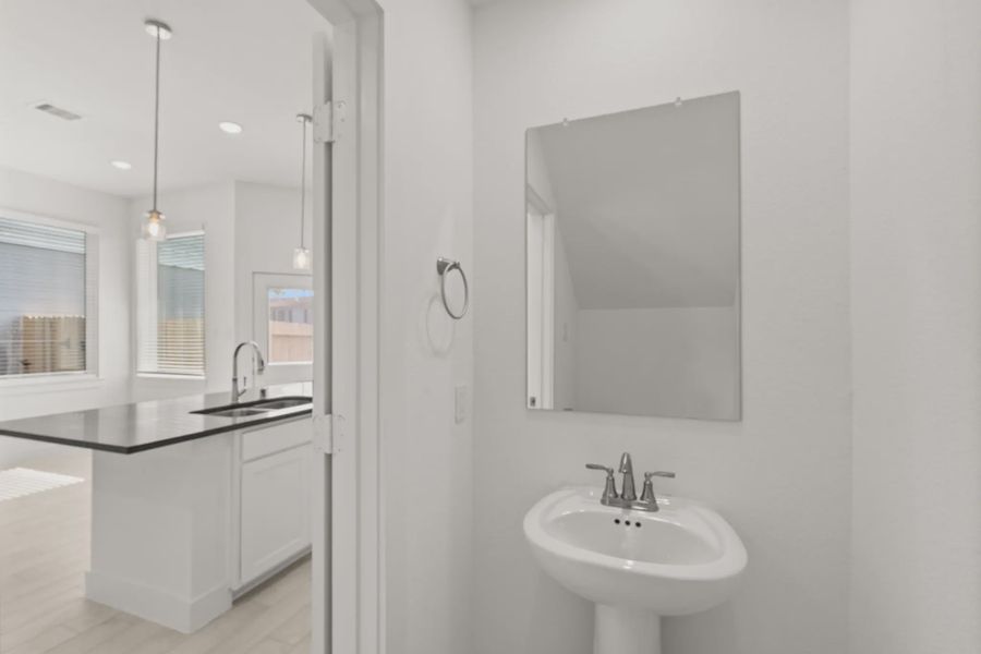 Representative furnished interior of a home built from the Cheverny by Chesmar Homes in Sienna Chateau, Missouri City (Image 5).