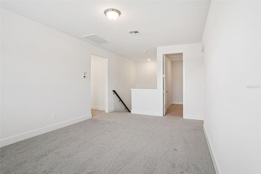 Spacious, unfurnished interior of a new home in Ridgehaven - Signature Series, Ormond Beach (Image 34).