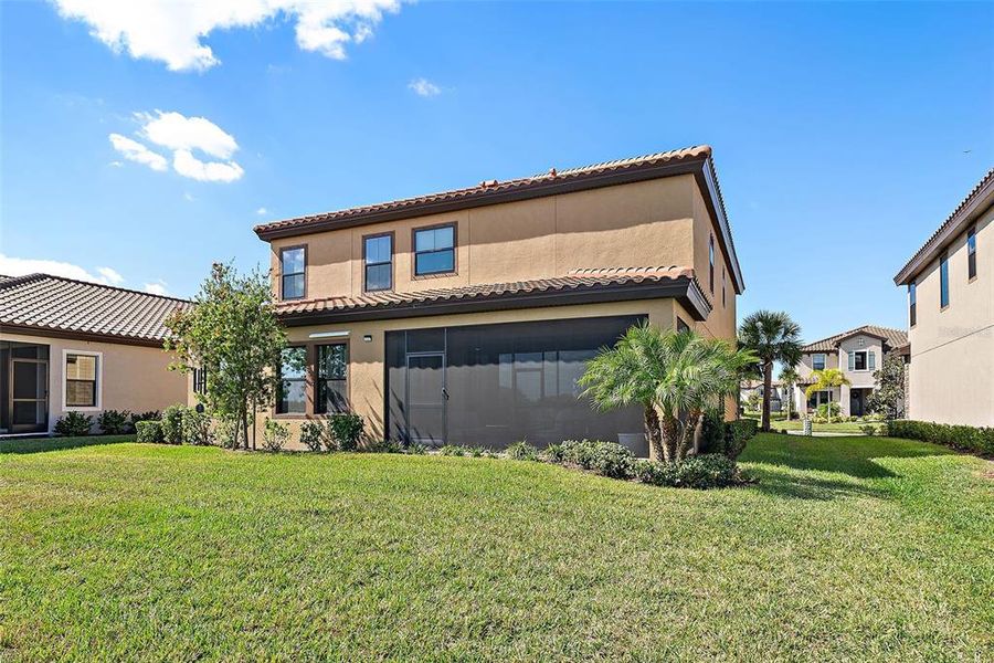 Front exterior of a new home in , Parrish, FL, highlighting curb appeal (Image 22).
