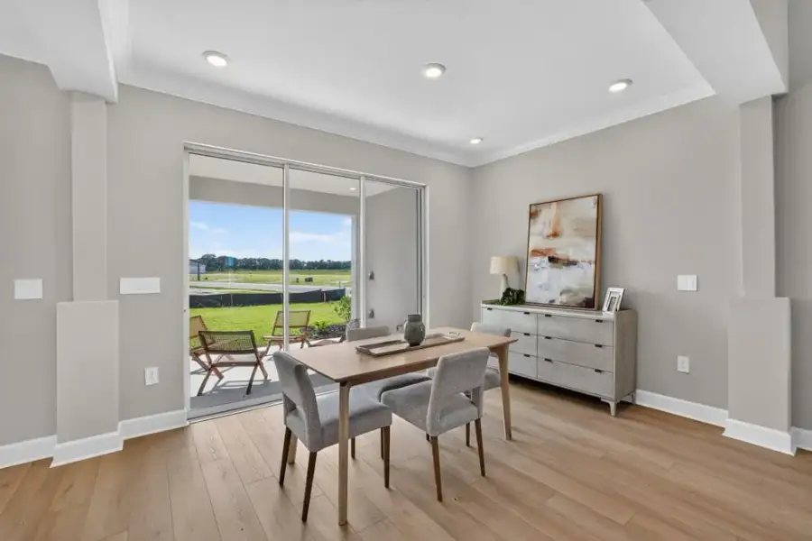 Furnished interior view inside a new home in Westview Community Group Page, Kissimmee (Image 12).