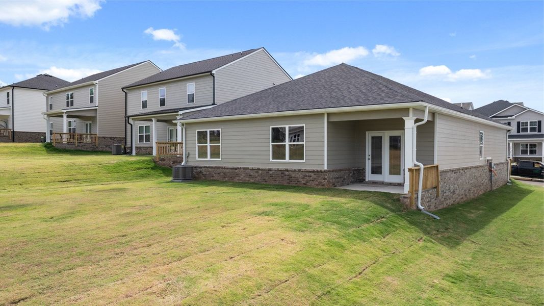 Front exterior of a new home in The Abbey at Trolley Run Station, Aiken, SC, highlighting curb appeal (Image 22).
