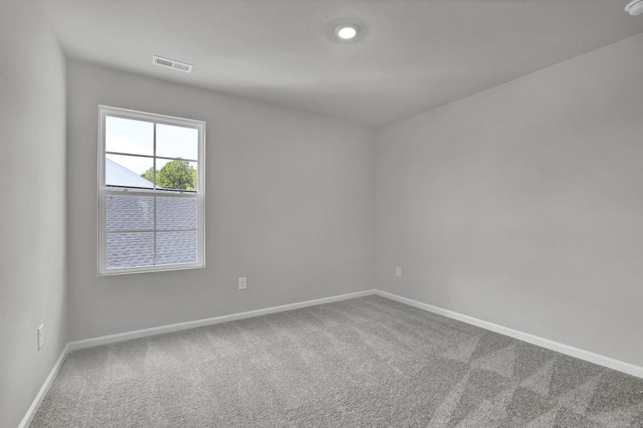 Spacious, unfurnished interior of a new home in River Tide Farms, Bolivia (Image 21).