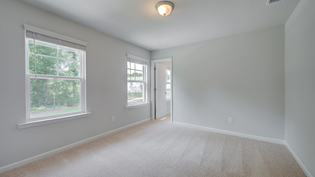 Furnished interior view inside a new home in Hamilton Lakes, Loganville (Image 19).