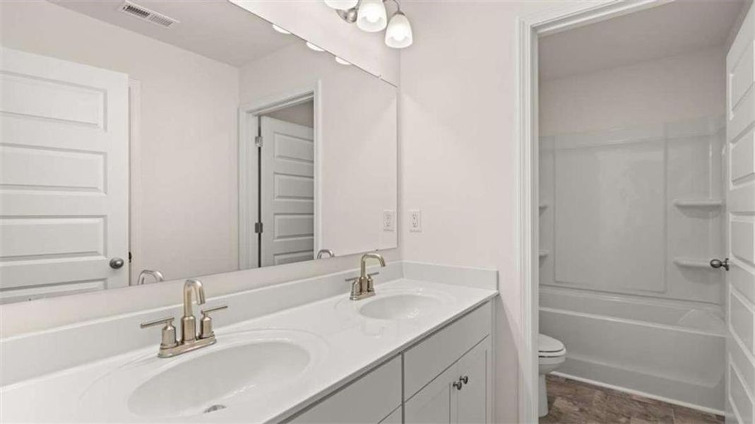 Furnished interior view inside a new home in Wildwood, Covington (Image 11). Furnished interior view inside a new home in Wildwood, Covington (Image 11).