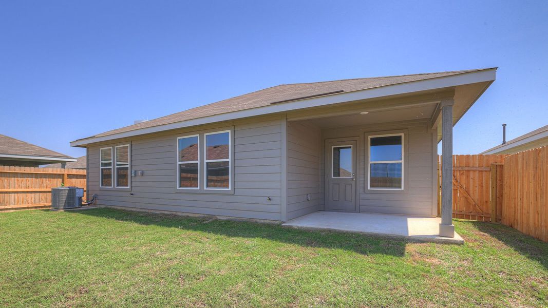 Front exterior of a new home in Navarro Fields, Seguin, TX, highlighting curb appeal (Image 20). Front exterior of a new home in Navarro Fields, Seguin, TX, highlighting curb appeal (Image 20).