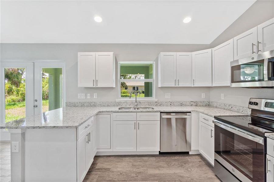 Furnished interior view inside a new home in , Port Charlotte (Image 2). Furnished interior view inside a new home in , Port Charlotte (Image 2).