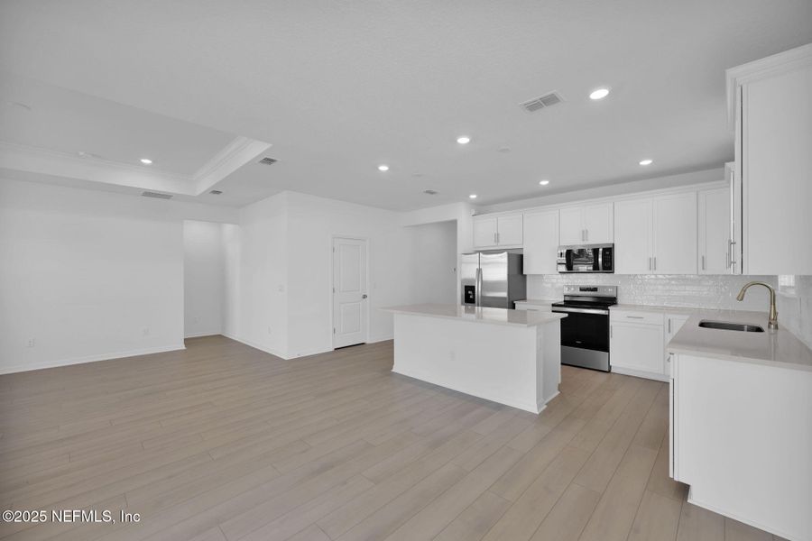 Furnished interior view inside a new home in Bradley Creek, Green Cove Springs (Image 5).