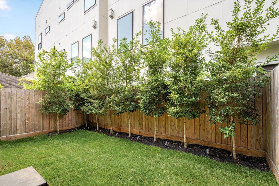 Exterior details and patio area of a home in , Houston (Image 24). Exterior details and patio area of a home in , Houston (Image 24).