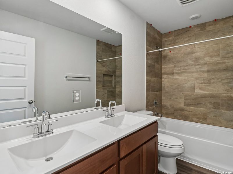 Furnished interior view inside a new home in Talley Fields, San Antonio (Image 11).