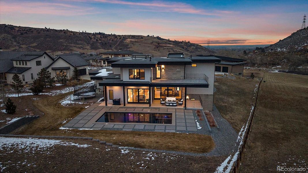 Western Exterior with Pool/Hot Tub & Backyard