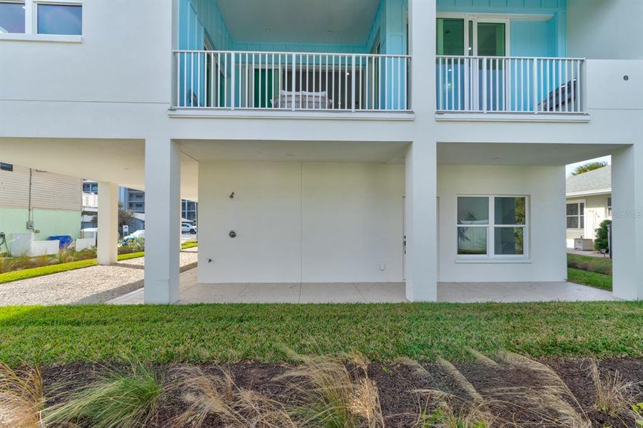 Exterior details and patio area of a home in , New Smyrna Beach (Image 29).
