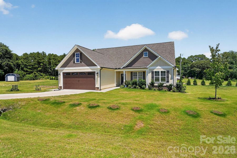 Front exterior of a new home in Savanna Oaks, Smithfield, NC, highlighting curb appeal (Image 18).