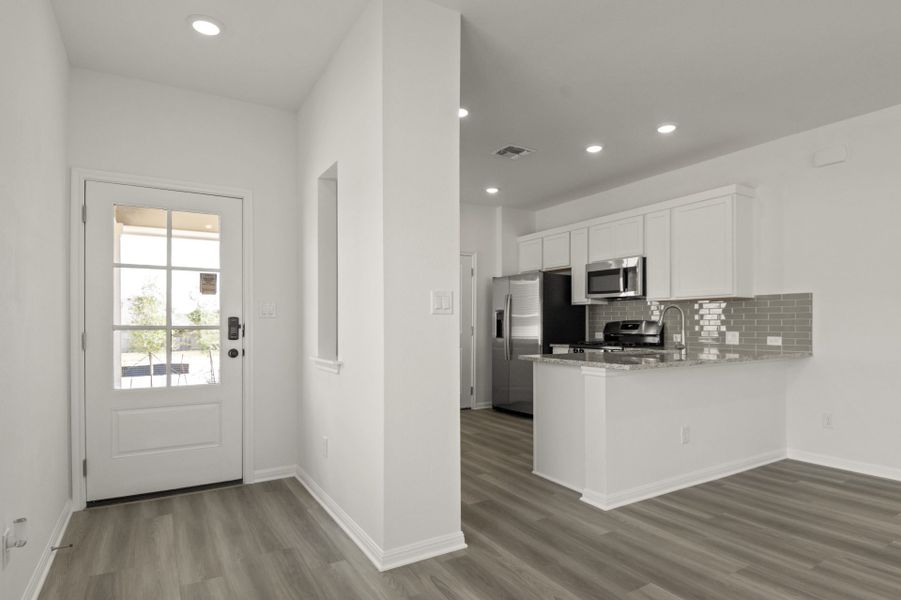 Furnished interior view inside a new home in Crosswinds, Kyle (Image 6).