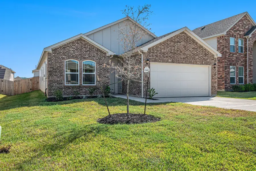 Front exterior of a new home in Clear View Estates, Willis, TX, highlighting curb appeal (Image 1). Front exterior of a new home in Clear View Estates, Willis, TX, highlighting curb appeal (Image 1).