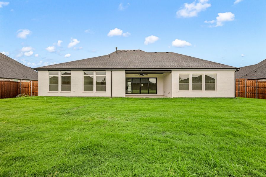 Exterior details and patio area of a home in NorthGlen, Haslet (Image 26).