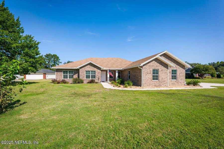 Front exterior of a new home in , Callahan, FL, highlighting curb appeal (Image 18).