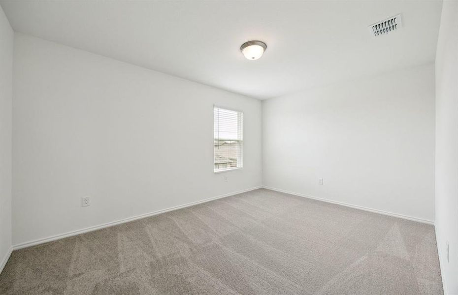 Secondary bedroom designed for comfort and convenience