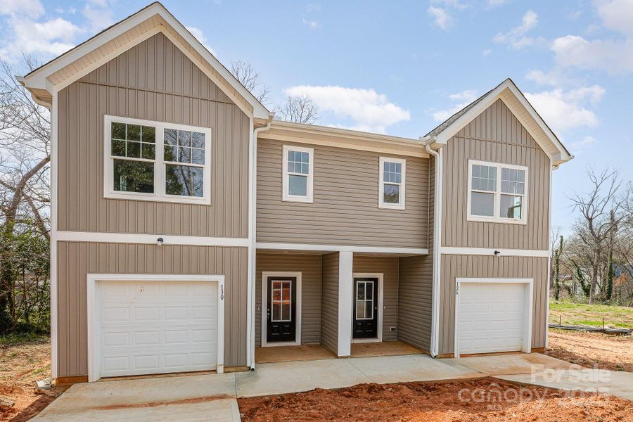 Front exterior of a new home in , Statesville, NC, highlighting curb appeal (Image 15).