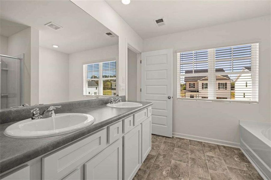 Furnished interior view inside a new home in Oakchase at Hampton, Hampton (Image 8).