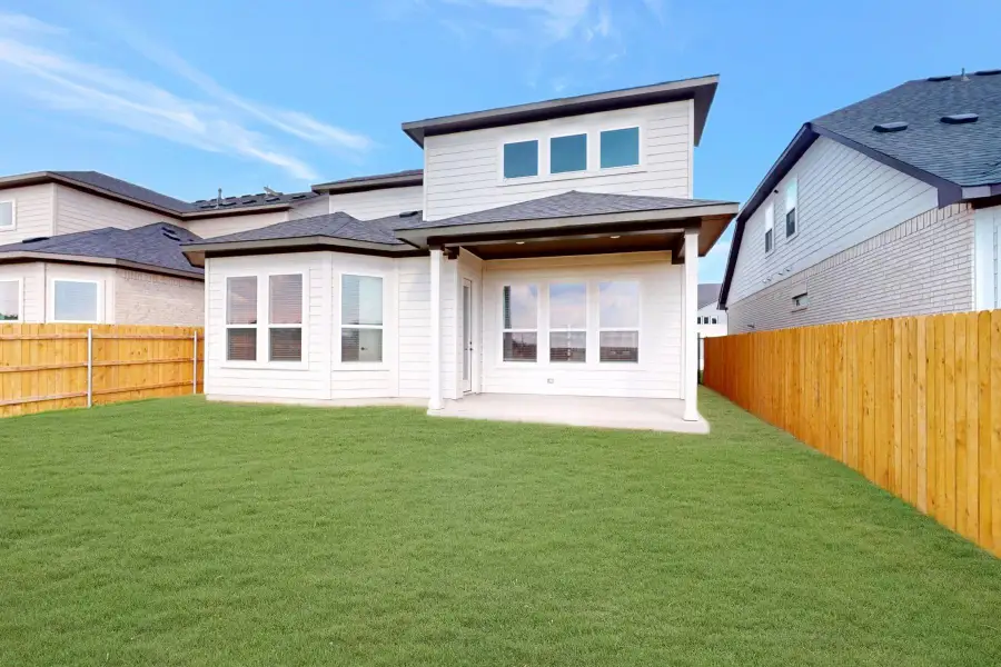 Exterior details and patio area of a home in Estancia West, Manchaca (Image 4). Exterior details and patio area of a home in Estancia West, Manchaca (Image 4).