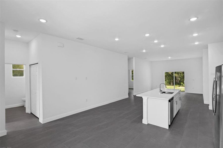 Furnished interior view inside a new home in , Dunnellon (Image 7).