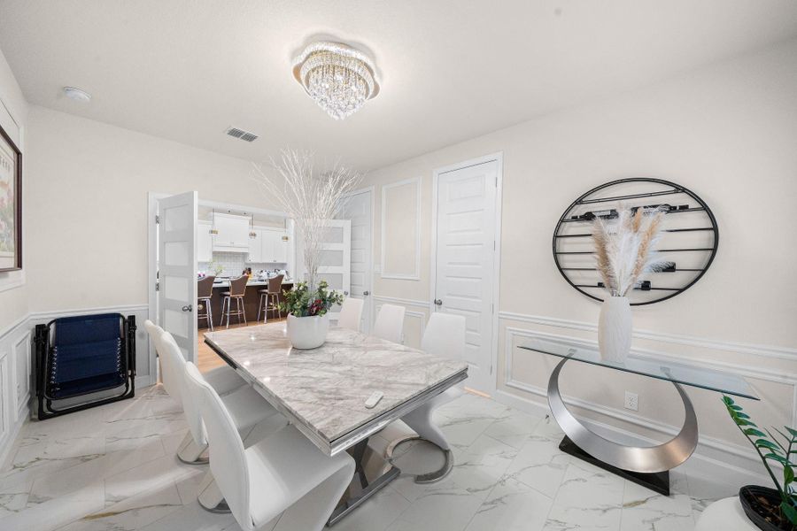 Furnished interior view inside a new home in Marvida, Cypress (Image 11).