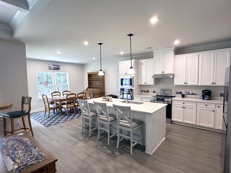 Furnished interior view inside a new home in , Awendaw (Image 28).