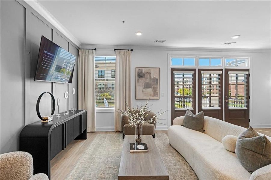 Entertain with ease on the main level with optional trim wall *Images shown are from a decorated model of the same floor plan. Design selections and color packages will vary by home.*