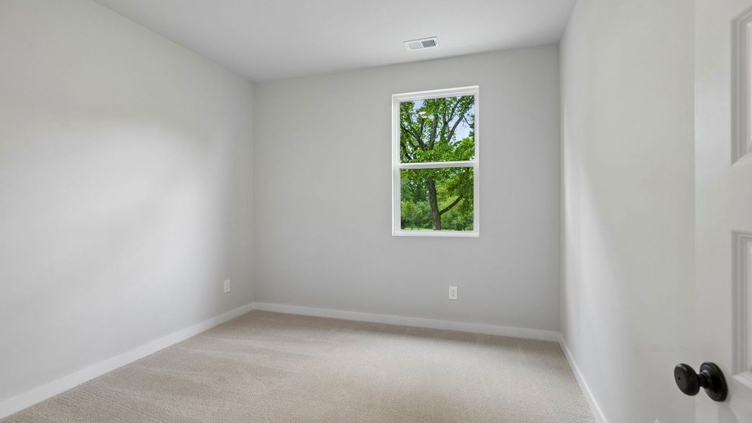 Representative unfurnished interior of a home built from the Holden by D.R. Horton in Harvest Point, Spring Hill (Image 63).