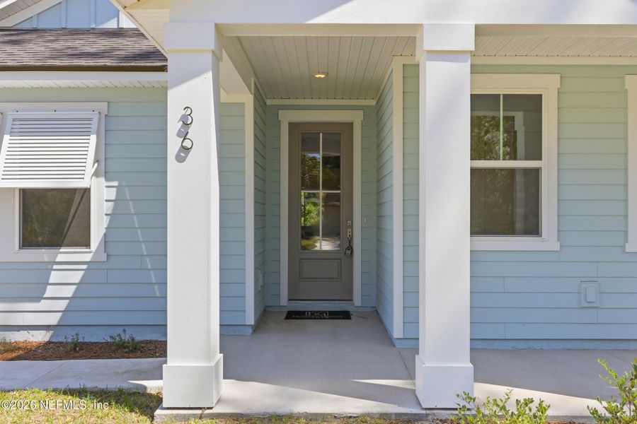 Exterior details and patio area of a home in Palm Coast Homes, Palm Coast (Image 30).