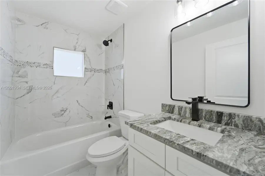 Furnished interior view inside a new home in , Port St. Lucie (Image 10).