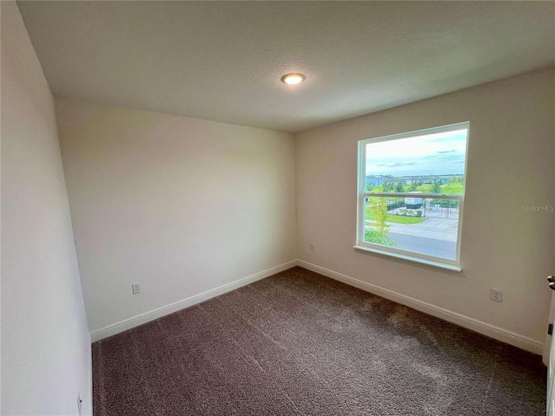 Spacious, unfurnished interior of a new home in Hammock Reserve, Haines City (Image 11).