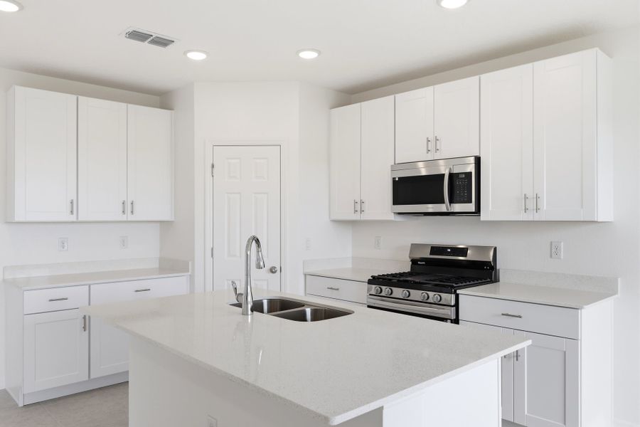 Furnished interior view inside a new home in Highfield at Twisted Oaks, Wildwood (Image 5).